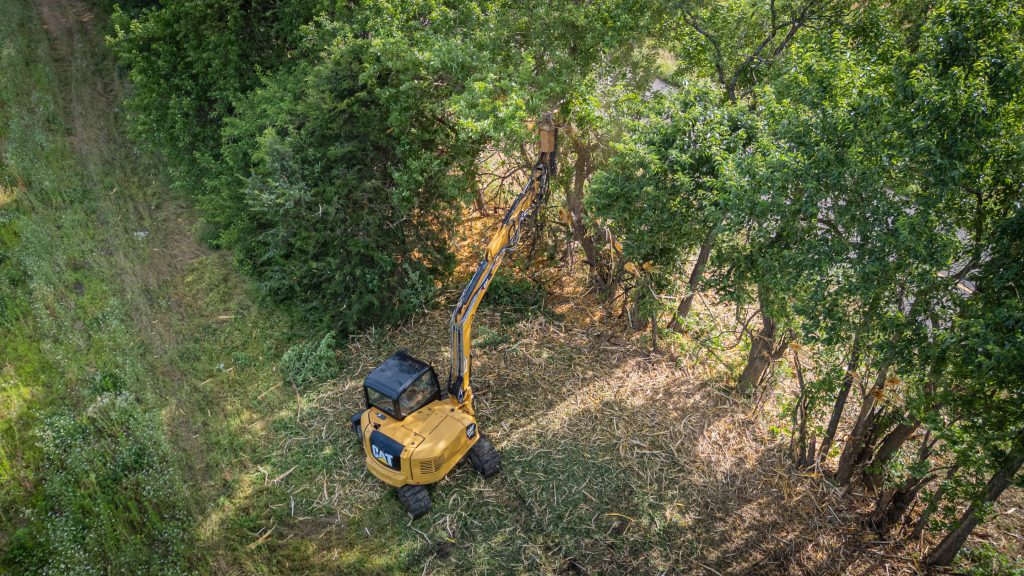 Aerial view of forestry mulching in action
