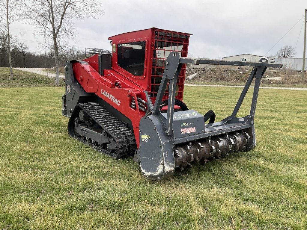 Heavy duty land clearing and forestry mulching equipment, showing the rugged attachment